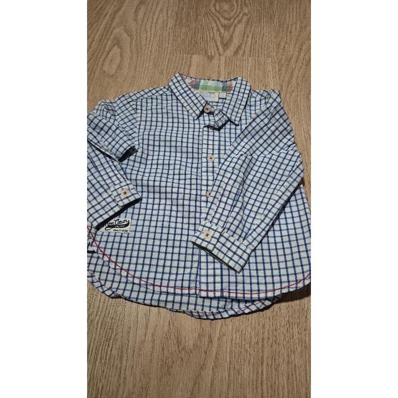 Chemise a carreaux blanche et bleue  TAILLE 6 mois 