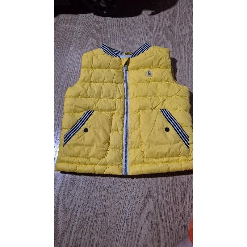 Doudoune sans manche jaune orchestra  TAILLE 12 mois 