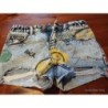 Short desigual smiley TAILLE 10