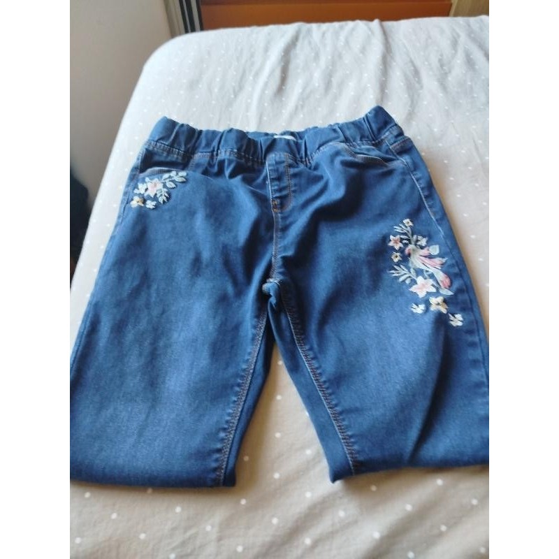 Jean bleu brodé perroquet  TAILLE 12 ans 