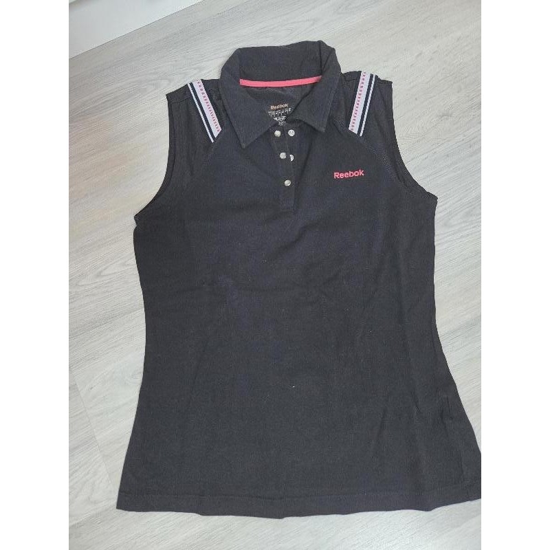 Polo sans manche noir  TAILLE L